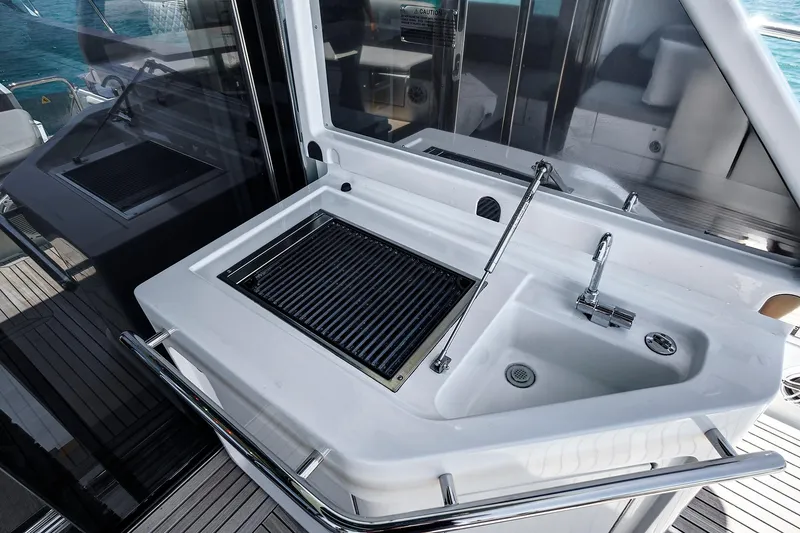 Slide: The Image of Outdoor sink and grill on 2015 Azimut 55S yacht deck. - 9
