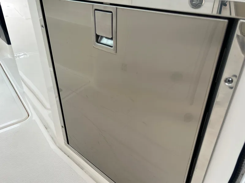 Slide: The Image of Stainless steel door on 2016 Pursuit 325 DC boat interior. - 13