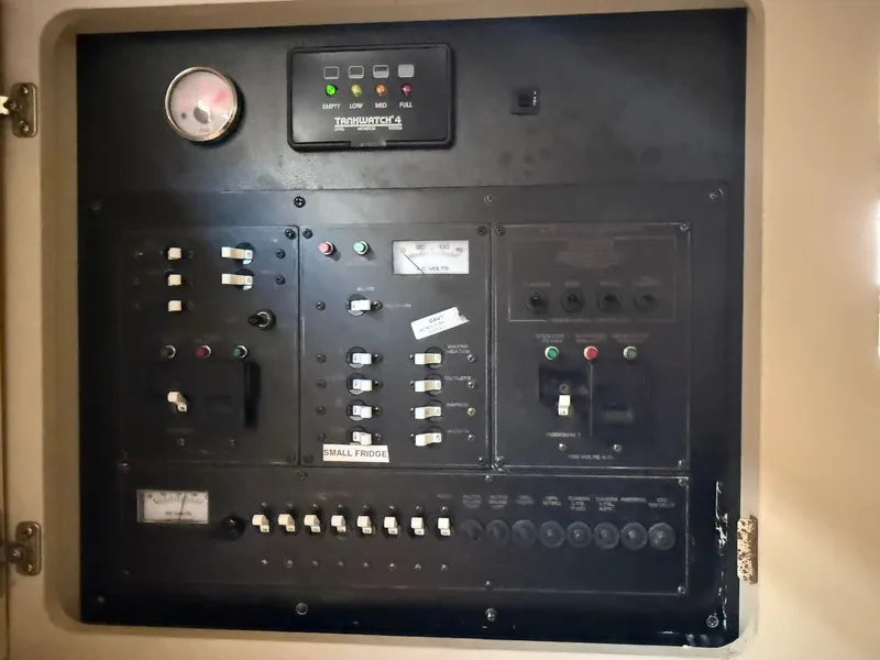 Slide: The Image of Electrical control panel on a 2000 Cruisers Yachts 3375 Express boat. - 26
