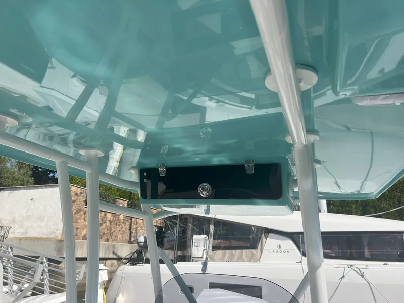 Slide: The Image of Reflex Gladiator 2400 boat interior, 2026 model, featuring sleek design and storage compartment. - 31