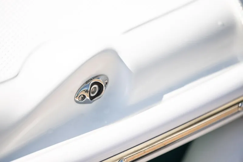 Slide: The Image of Close-up of Reflex Gladiator 2400 boat detail, featuring sleek design and metallic fixture, 2026 model. - 44