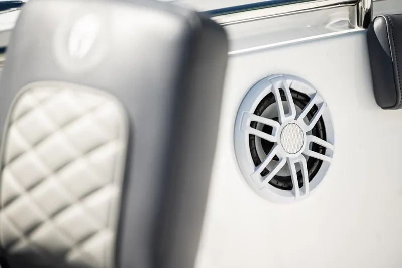 Slide: The Image of Close-up of a Reflex Gladiator 2400 boat speaker, featuring quilted upholstery, 2026 model. - 45