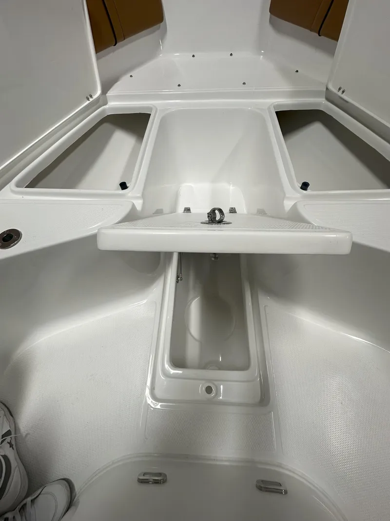 Slide: The Image of Interior view of Reflex Gladiator 2400 boat, showcasing storage compartments and sleek design, 2026 model. - 48