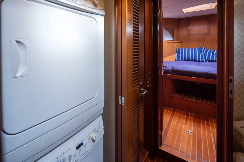 Slide: The Image of Laundry area and cozy cabin in 2006 Alaskan 65 Flushdeck yacht interior. - 31