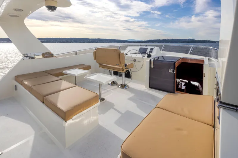Slide: The Image of Luxurious 2006 Alaskan 65 Flushdeck yacht with spacious seating and scenic ocean view. - 48
