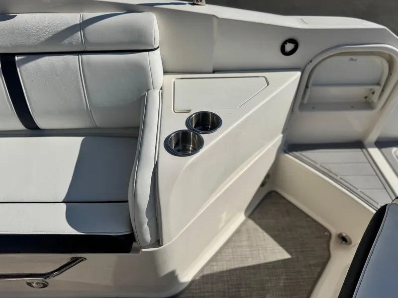 Slide: The Image of Interior of 2015 Sea Ray 270 SDX boat with seating and cup holders. - 26