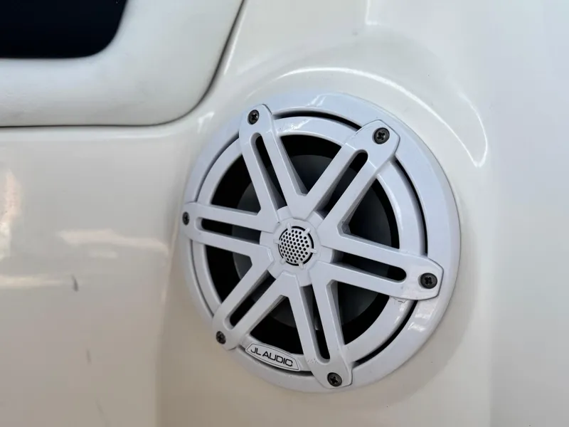Slide: The Image of White JL Audio speaker on 2015 Sea Ray 270 SDX boat. - 34