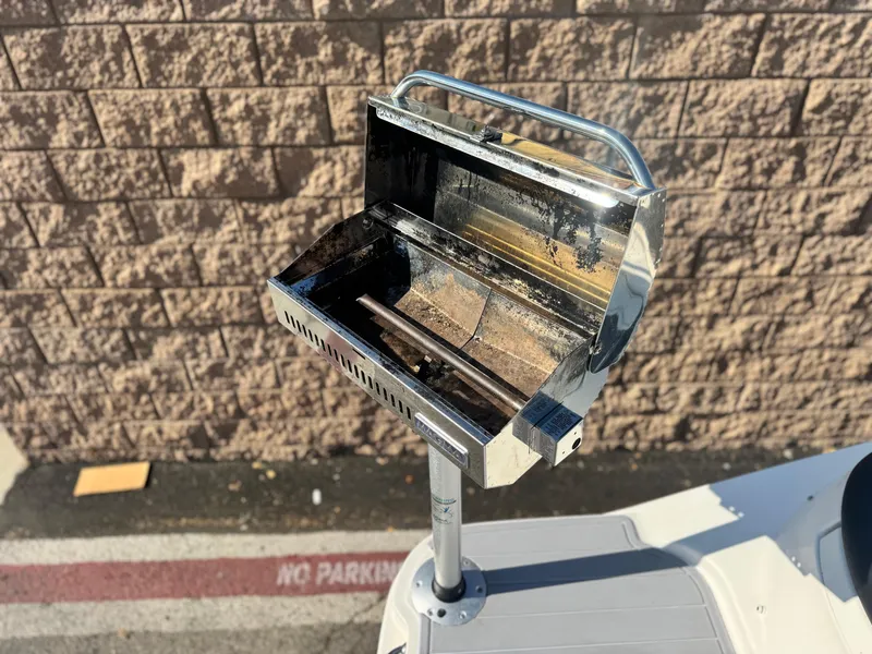 Slide: The Image of Stainless steel grill mounted on a 2015 Sea Ray 270 SDX boat. - 8