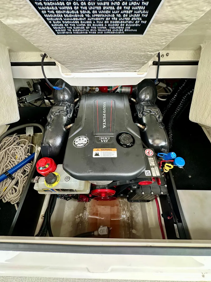 Slide: The Image of Engine compartment of 2023 Regal 2800 Bowrider with Volvo Penta 380 V8 engine. - 18