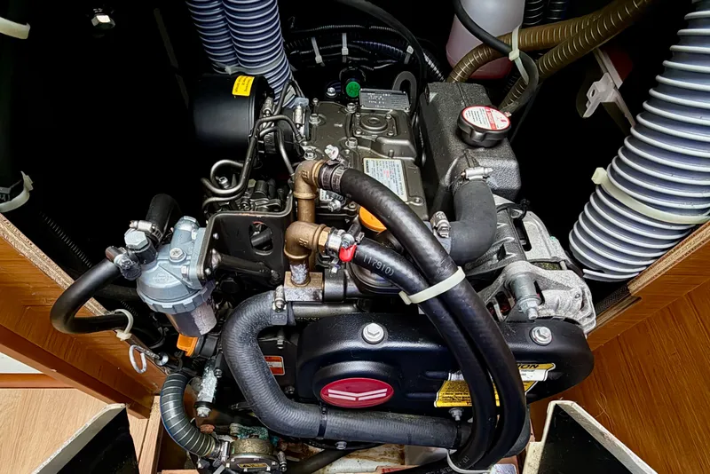 Slide: The Image of Engine compartment of a 2021 Jeanneau Sun Odyssey 349 sailboat, showcasing detailed components. - 31