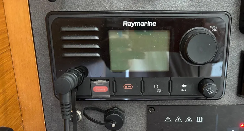 Slide: The Image of Raymarine marine radio on 2021 Jeanneau Sun Odyssey 349 sailboat dashboard. - 20