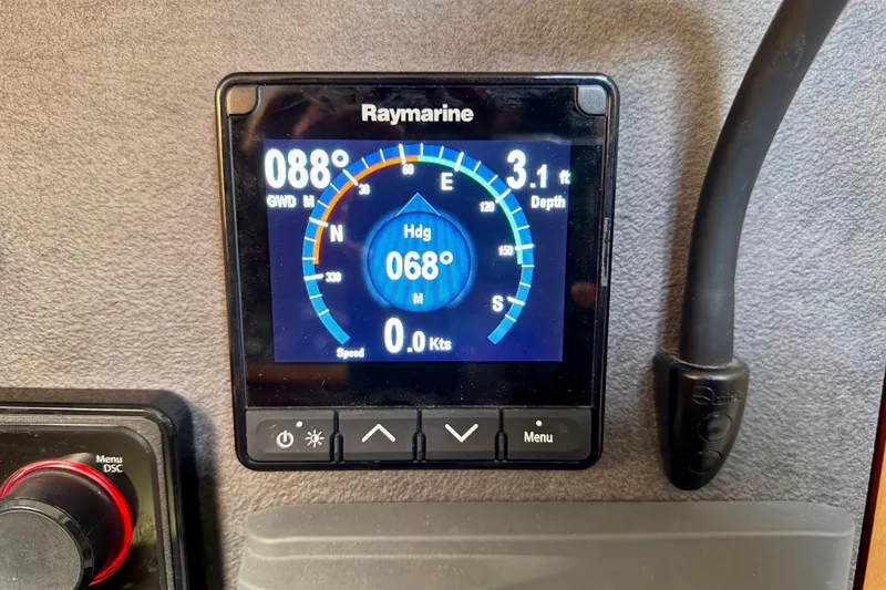Slide: The Image of Raymarine navigation display on 2021 Jeanneau Sun Odyssey 349, showing heading and depth. - 38