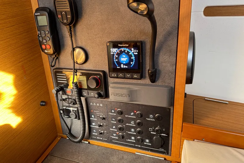 Slide: The Image of Control panel of a 2021 Jeanneau Sun Odyssey 349 sailboat with navigation instruments. - 37