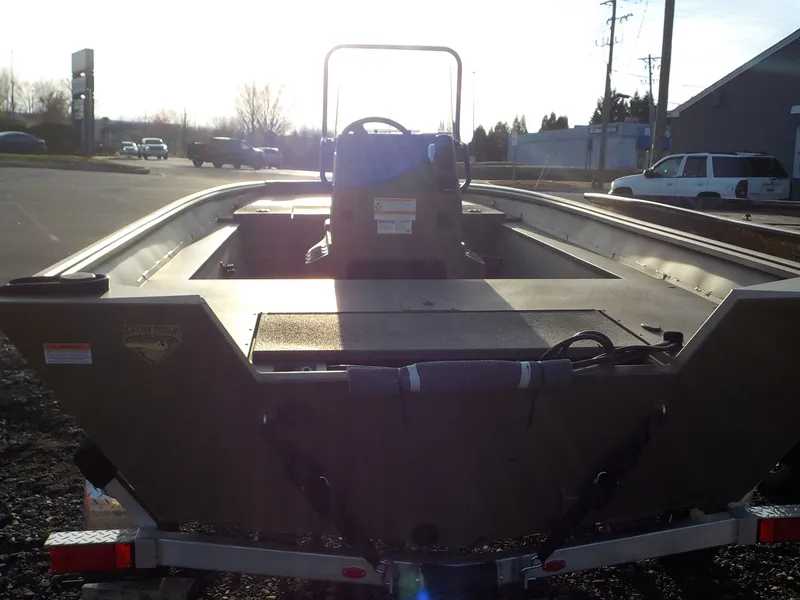 Slide: The Image of 2025 G3 Gator Tough 18 CC boat on trailer outdoors. - 4