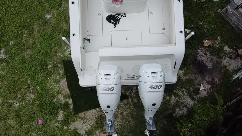 Slide: The Image of Overhead view of a 2011 Mako 284 CC boat with twin 400 horsepower engines. - 28