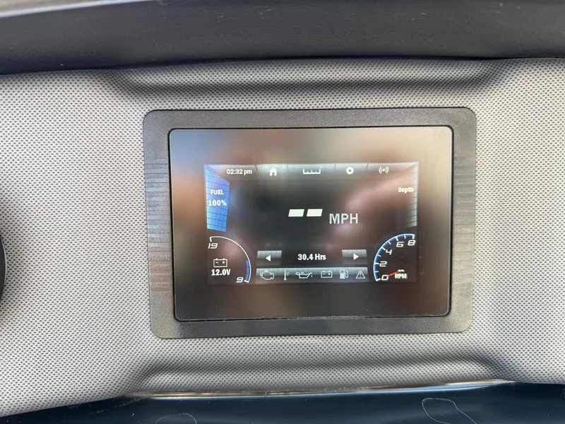 Slide: The Image of Dashboard display of a 2021 Yamaha Boats AR195 showing speed and fuel level. - 26