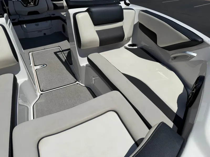 Slide: The Image of 2021 Yamaha Boats AR195 interior seating with gray and black upholstery. - 36