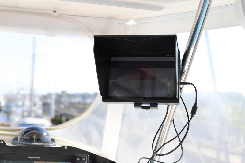 Slide: The Image of Boat navigation screen on a 2020 Robertson Leopard yacht, displaying marine data. - 10