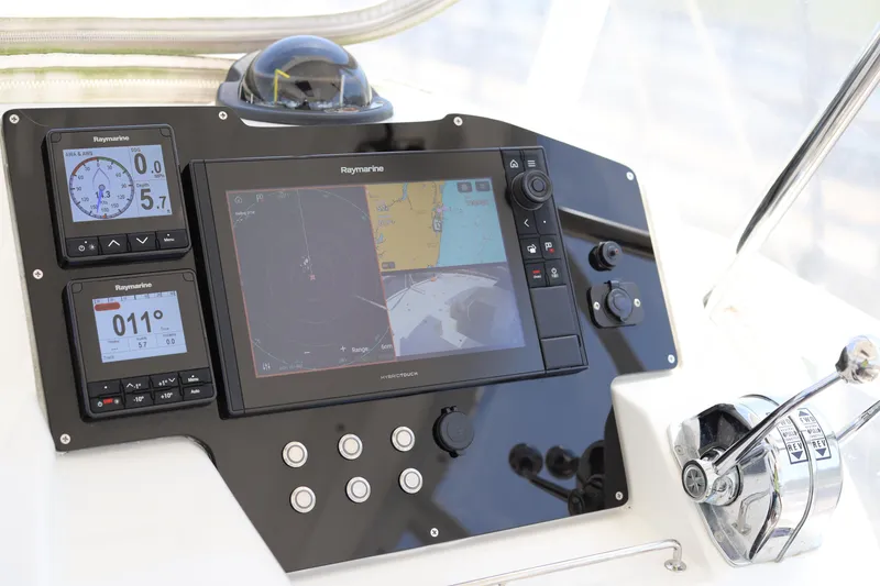 Slide: The Image of Boat control panel with Raymarine navigation system, Robertson Leopard 2020 model. - 12