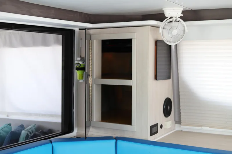 Slide: The Image of Interior of 2020 Robertson Leopard yacht with modern cabinetry and fan. - 25