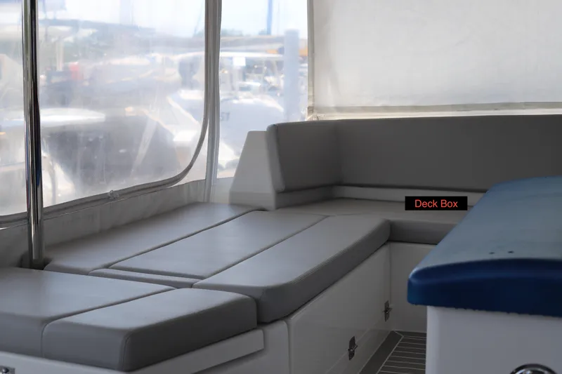 Slide: The Image of Interior seating area of a 2020 Robertson Leopard boat with deck box. - 29