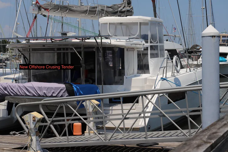 Slide: The Image of 2020 Robertson Leopard yacht docked, labeled "New Offshore Cruising Tender." - 3