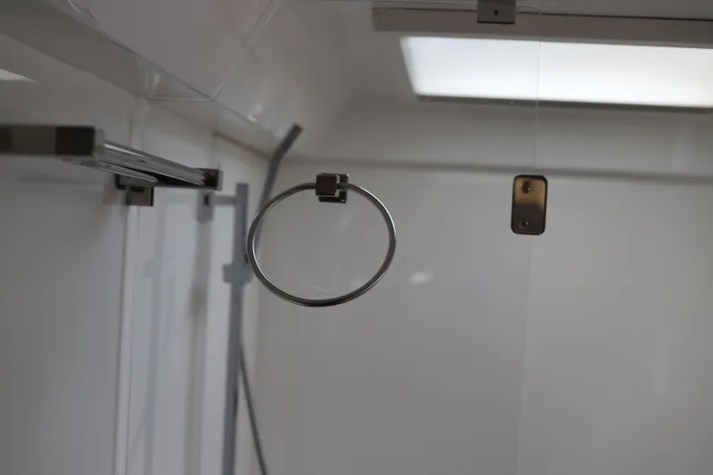 Slide: The Image of Modern bathroom interior with metal towel ring and glass shower door, Robertson Leopard 2020 model. - 40