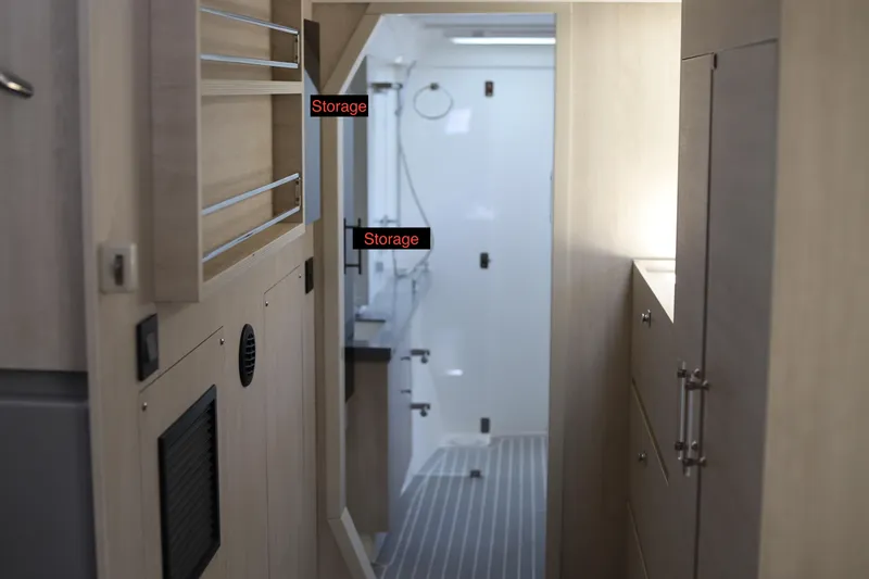 Slide: The Image of Interior of 2020 Robertson Leopard with wooden storage cabinets and modern design. - 44