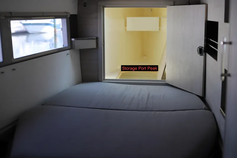 Slide: The Image of Interior cabin of 2020 Robertson Leopard boat with storage port peak access. - 49