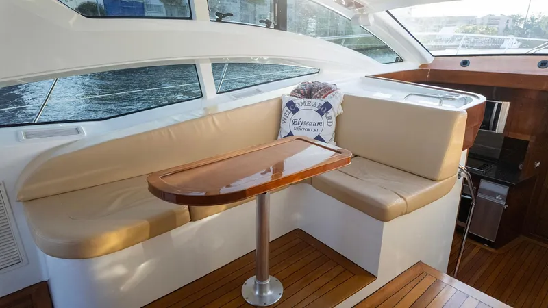 Slide: The Image of Luxurious interior of 2008 Savannah 54 yacht with elegant seating and wooden table. - 26