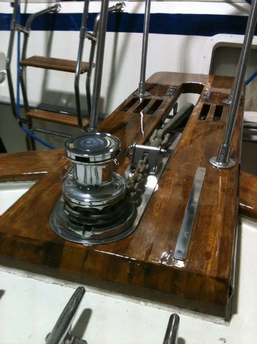 Slide: The Image of 1973 Trojan F-32 boat deck with polished wood and metal fittings. - 3