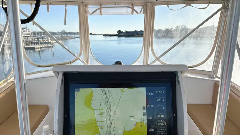 Slide: The Image of Interior view of a 1979 Buddy Davis 46 Convertible boat with navigation screen. - 5