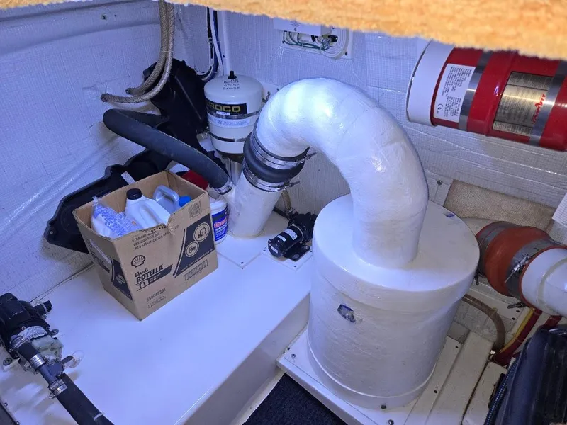 Slide: The Image of Engine room of 2015 American Tug 365 Flybridge with equipment and supplies. - 20
