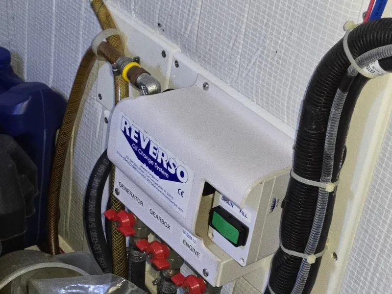 Slide: The Image of Reverso oil change system in 2015 American Tug 365 Flybridge engine room. - 25