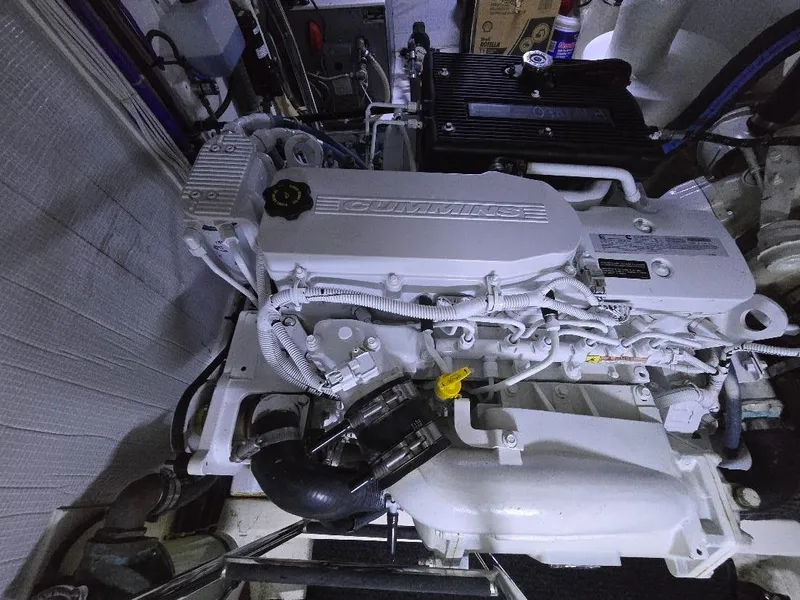 Slide: The Image of Engine room of 2015 American Tug 365 Flybridge with Cummins engine. - 27