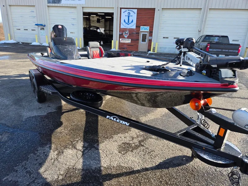 Slide: The Image of 2025 Falcon Boats F205 on trailer outside marine service center. - 5
