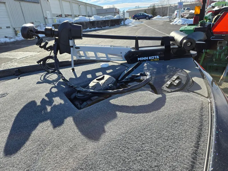 Slide: The Image of 2025 Falcon Boats F205 with Minn Kota Ultrex trolling motor on deck. - 6