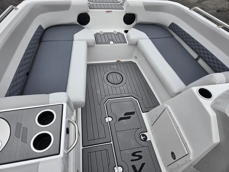 Slide: The Image of 2025 Starcraft SVX191 boat interior with gray seating and modern design. - 3