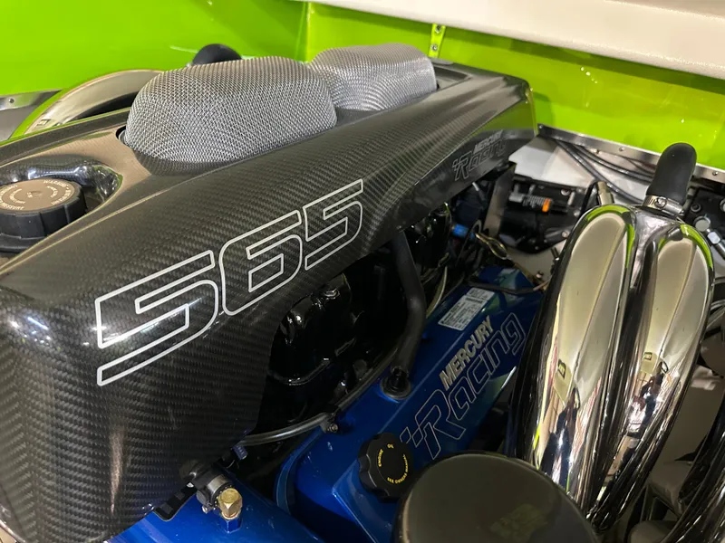 Slide: The Image of Engine of 2025 Velocity 40 RAPTOR with Mercury Racing components and carbon fiber cover. - 21