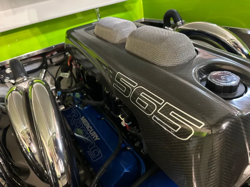 Slide: The Image of Engine of 2025 Velocity 40 RAPTOR with carbon fiber cover and Mercury Racing components. - 22