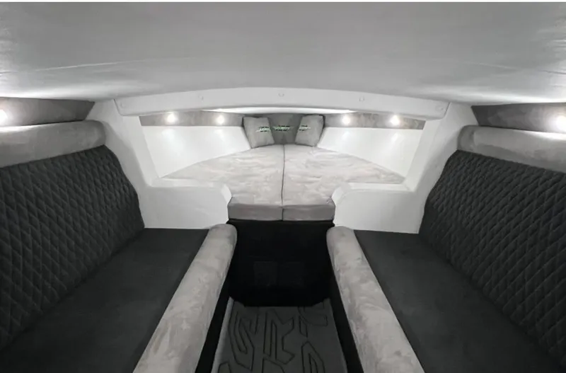Slide: The Image of Interior of 2025 Velocity 40 RAPTOR boat with plush seating and modern design. - 33