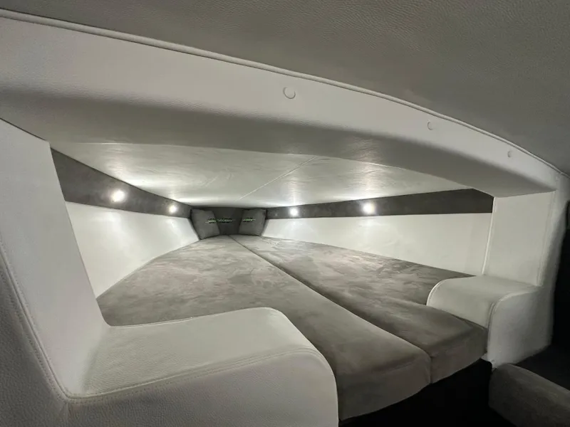 Slide: The Image of Interior cabin of 2025 Velocity 40 RAPTOR boat, featuring sleek design and ambient lighting. - 34