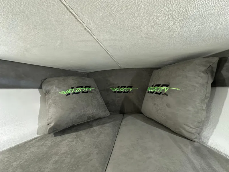 Slide: The Image of Gray cushions with "Velocity" logo in a 2025 Velocity 40 RAPTOR interior. - 35