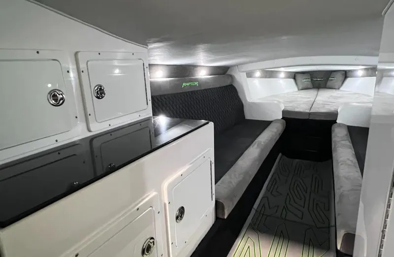 Slide: The Image of Interior of 2025 Velocity 40 RAPTOR boat with sleek seating and modern design. - 36