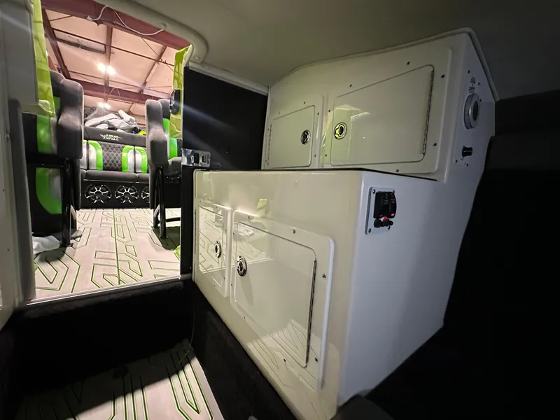 Slide: The Image of Interior of 2025 Velocity 40 RAPTOR boat with modern seating and storage compartments. - 43
