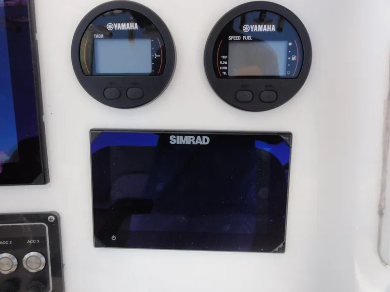 Slide: The Image of Dashboard of 2017 Sea Fox 249 Avenger with Yamaha gauges and Simrad display. - 16