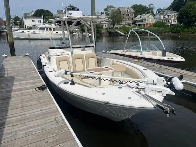 Slide: The Image of 2017 Sea Fox 249 Avenger boat docked at a marina, featuring a sleek design and modern amenities. - 23