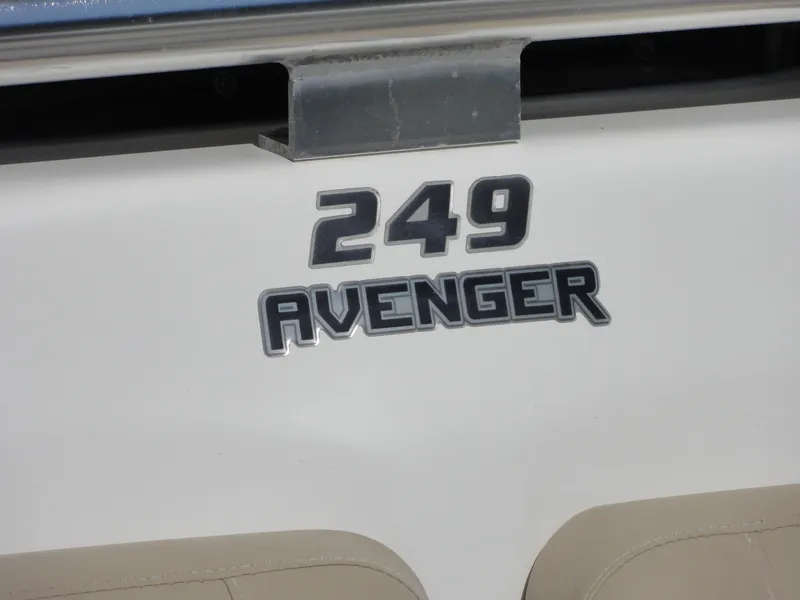 Slide: The Image of 2017 Sea Fox 249 Avenger boat model emblem on white surface. - 4