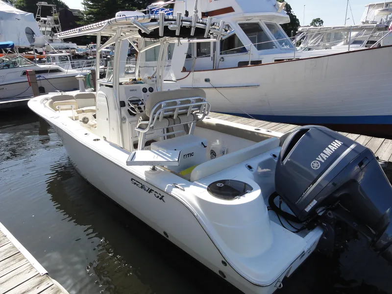 Slide: The Image of 2017 Sea Fox 249 Avenger boat docked with Yamaha outboard motor. - 5