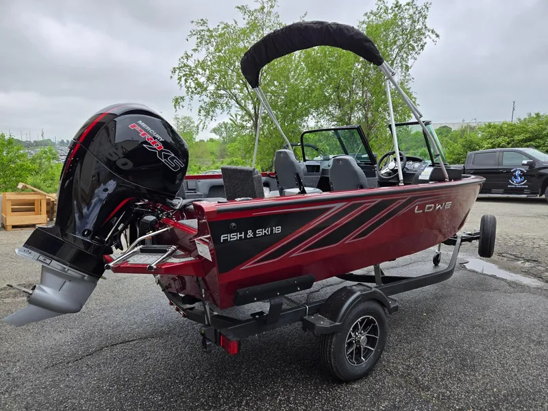 Slide: The Image of 2025 Lowe FS1800 Fish & Ski boat with Mercury Pro XS engine on trailer. - 5